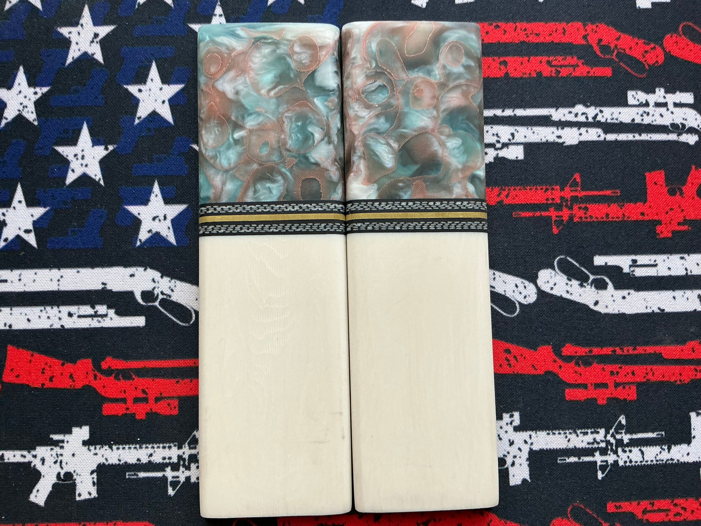 Faux Ivory with Copper Infused Bolsters, G10, Carbon Fober, and Brass Spacers with Black Liner