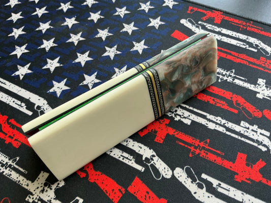 Faux Ivory with Copper Infused Bolsters, G10, Carbon Fober, and Brass Spacers with Black Liner